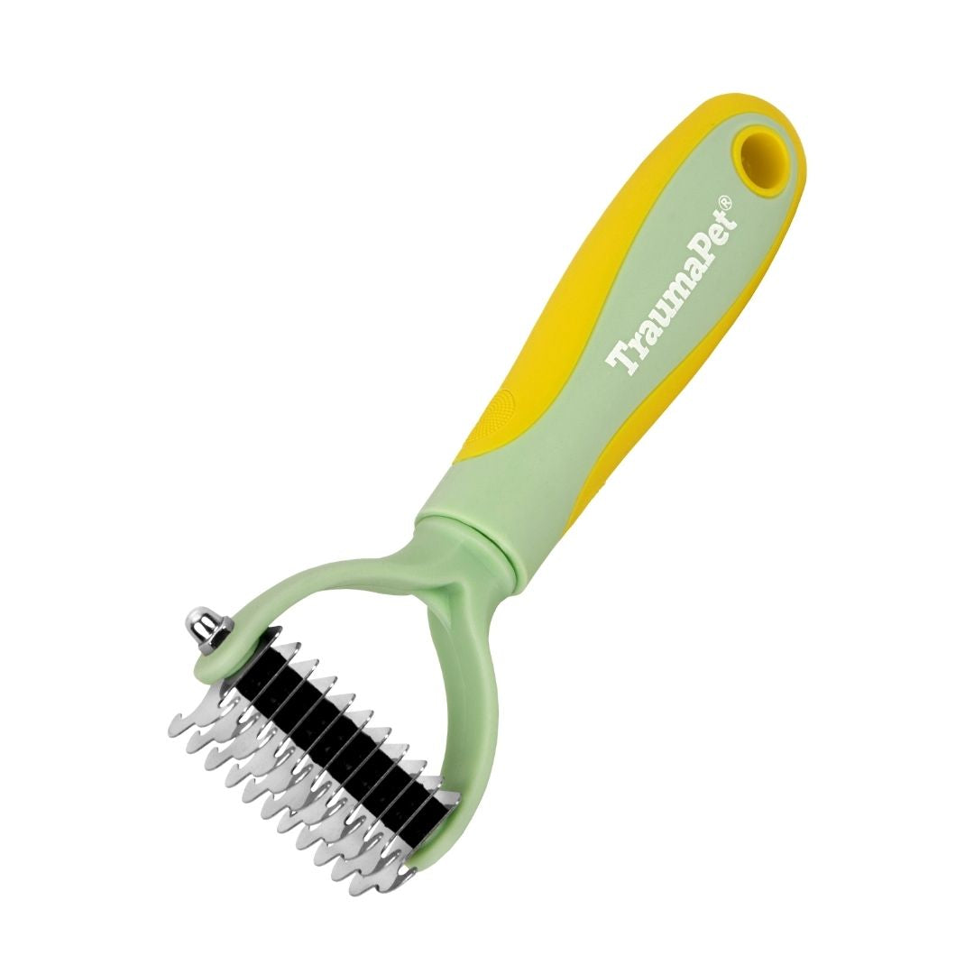 Doppelseitiger Unterhaarkamm für Hund und Katze: entfernt lose Unterwolle und entwirrt das Fell auf sanfte und effektive Weise.